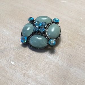 Blue brooch on silver metal base